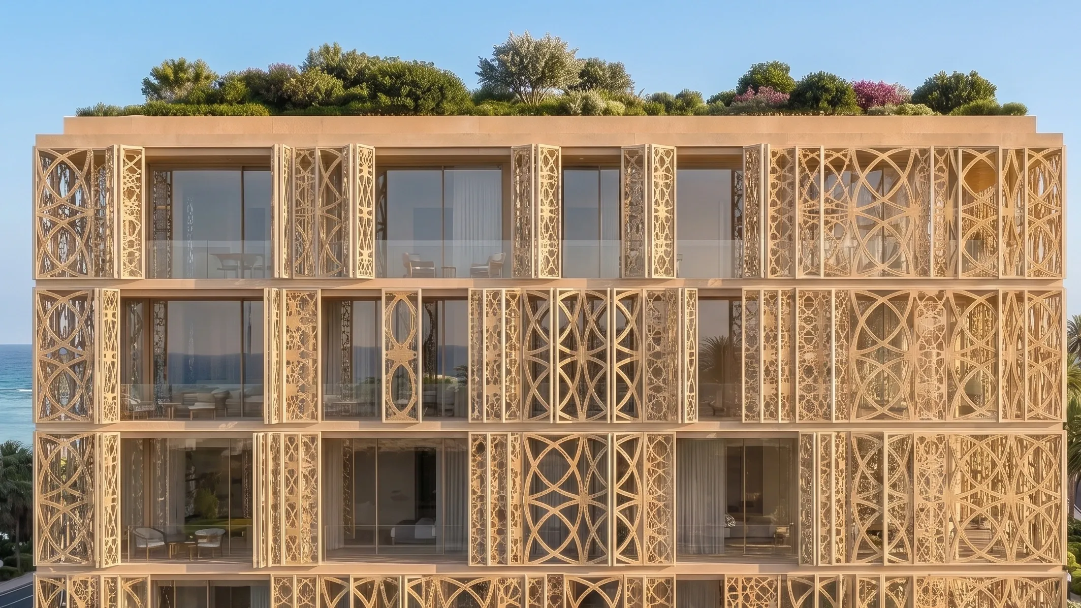 A Mira Ocean Estates building with carved facade screens beneath a planted roof garden