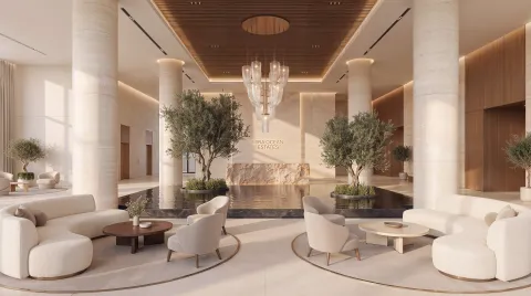 The Mira Ocean Estates lobby, with olive trees and a reflecting pool